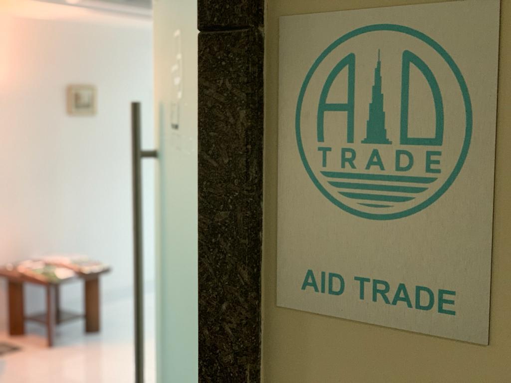 Aid Trade office entrance with the company plaque